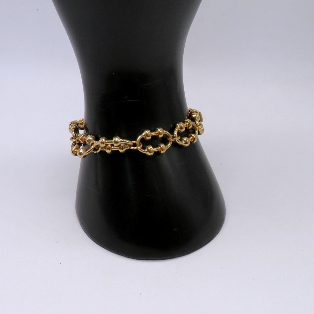 Avon Vintage Gold Tone‎ Link Bracelet Textured Equestrian Style Fold Over Clasp